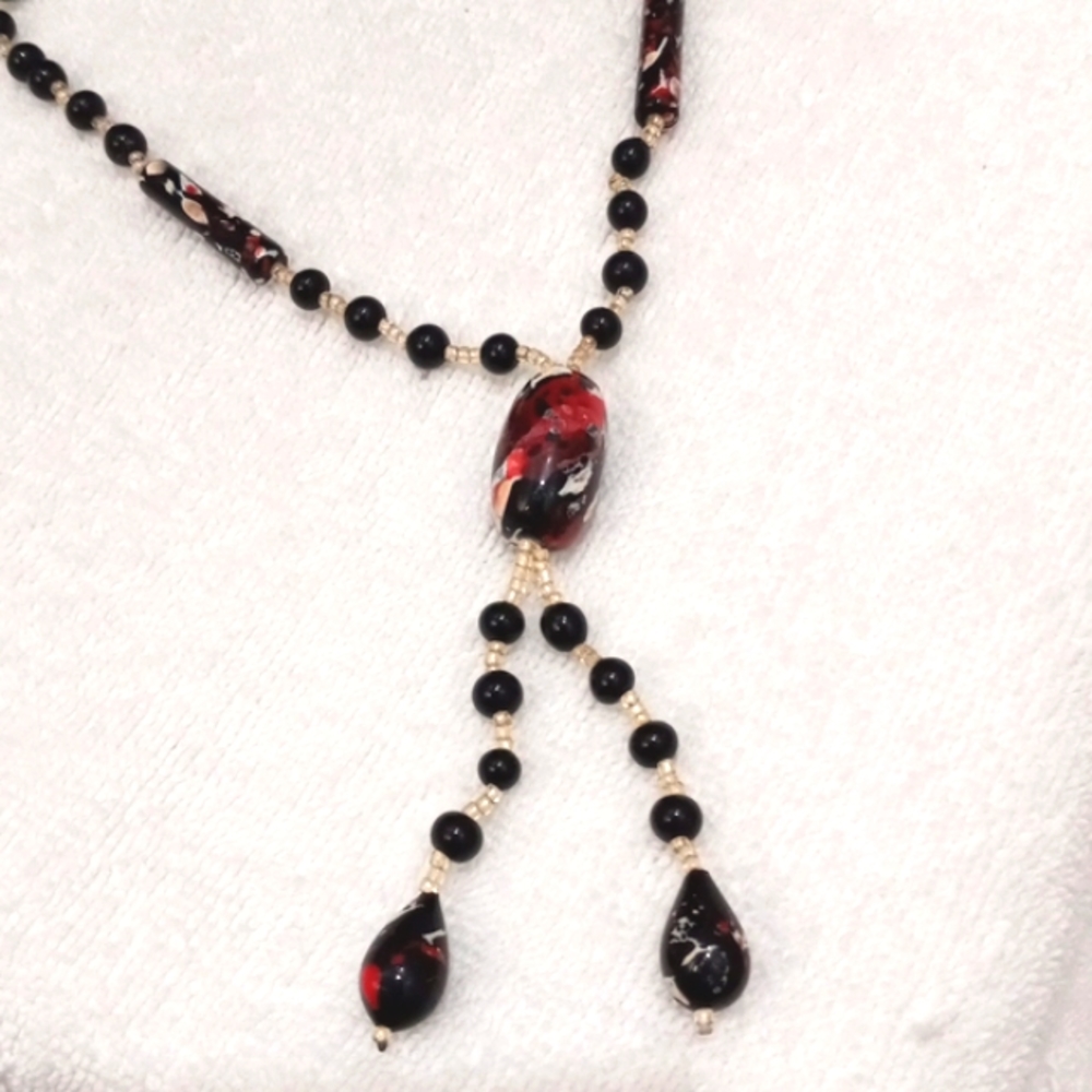 Seed Beads and Black painted plastic & smaller black beads